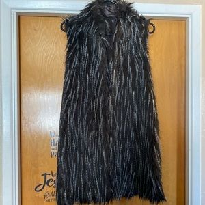Feather vest size Large.